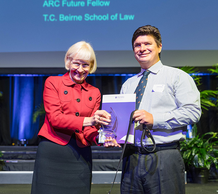 Associate Professor Paul Harpur, ARC Future Fellow, T.C. Beirne School of Law, Leadership Winner, 2022 UQ Awards for Excellence with Professor Deborah Terry AO, Vice-Chancellor and President.