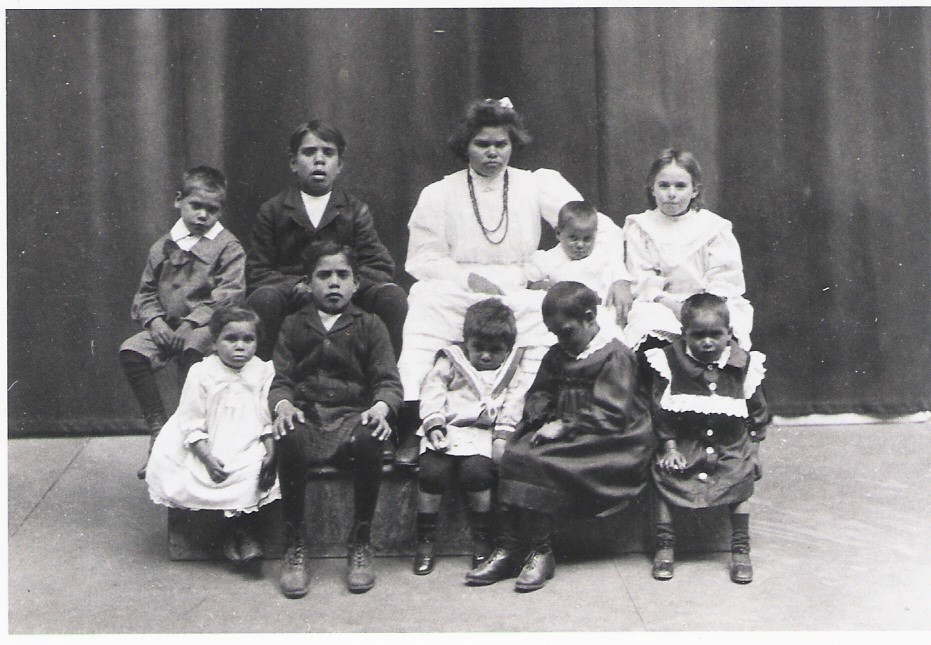 Ruby Pearce with other young Aboriginal and Torres Strait Islander children